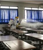 Penyemprotan disinfektan sekolah